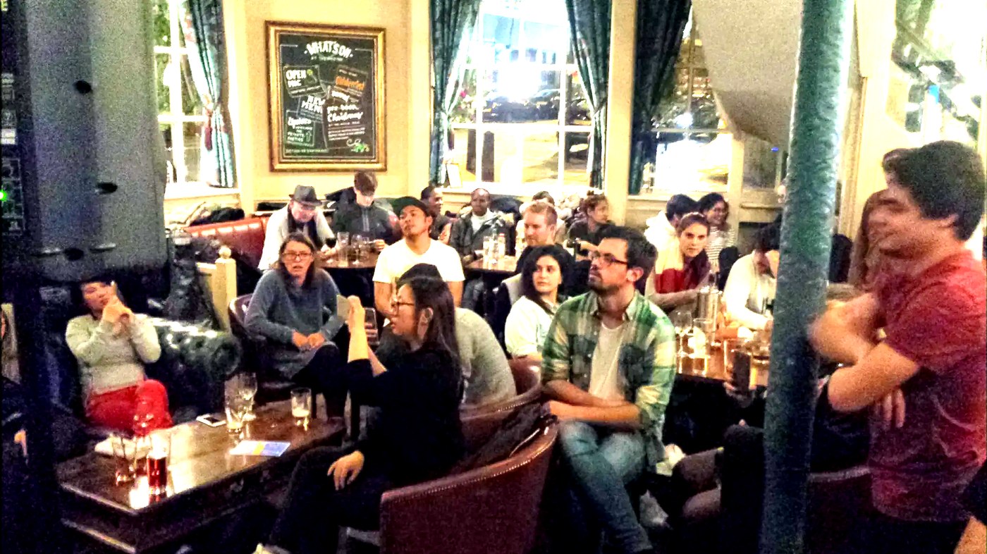 A pub audience enjoying an intimate live performance